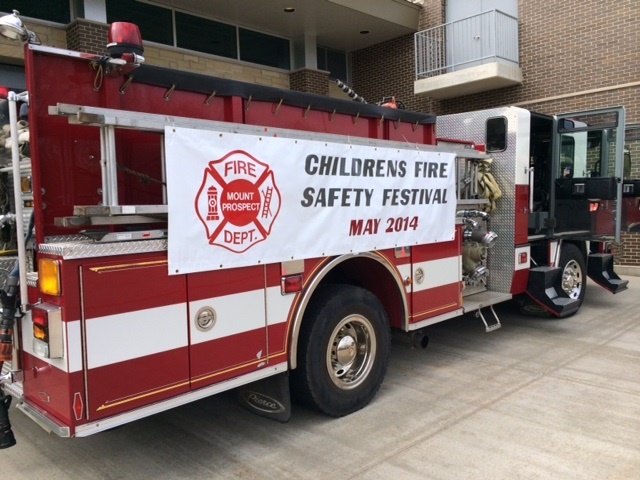 A fire truck displaying a banner